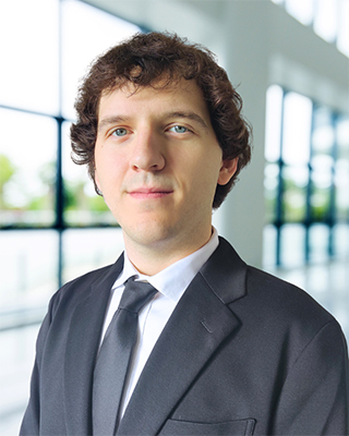 Photo of Adam Vlna, Systems Engineer, Rivel